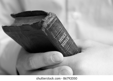 Young Man Holding Bible