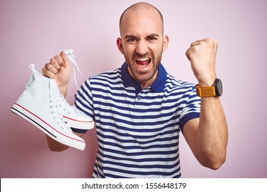 Young Man Holding Casual Sneakers Shoes Stock Photo 1556448179 ...