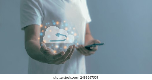 Young Man holding cloud computing diagram and smartphone mobile in hand, Data storage, Cloud technology, Cloud Computing Storage