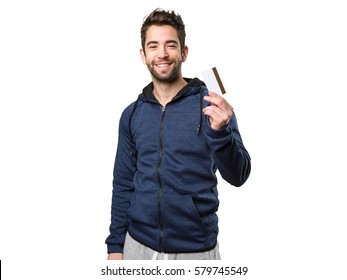 Young Man Holding A Credit Card