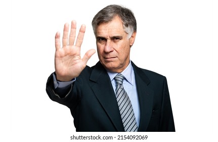 A Young Man Holding Up His Hand In A Stop Sign