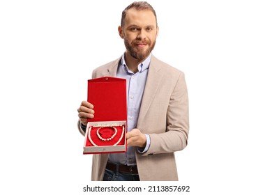 Young Man Holding A Jewellery Box With A Pearl Necklace And Bracelet Isolated On White Background