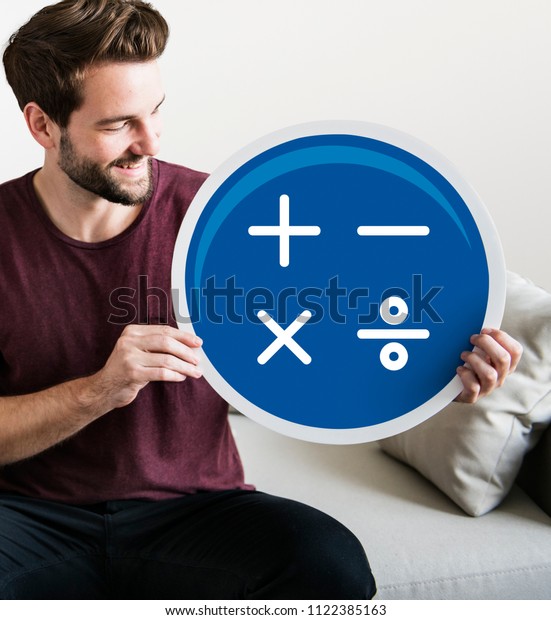 Young man holding a\
mathematics icon