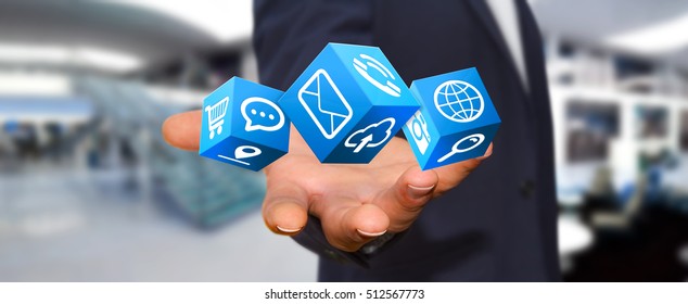 Young man holding modern digital icon application in his hand 3D rendering - Shutterstock ID 512567773