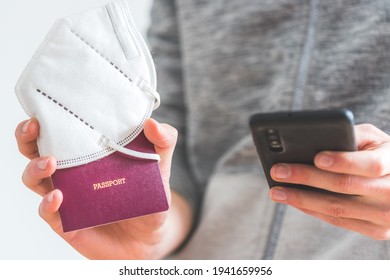 Young Man Is Holding A Passport, Ffp2 Mask And Smartphone On The Airport, “passport”