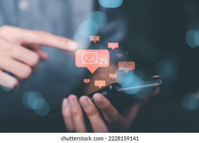 young man holding a smartphone Displays global communication network connections, cyberspace technology, online information exchange, internet of things, Notifications from applications