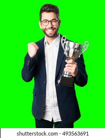 Young Man Holding A Trophy