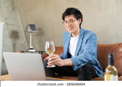 Young man at home enjoying a video call - Powered by Shutterstock