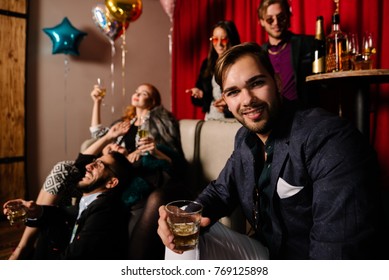 Young man hosting a crazy party
