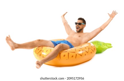 Young Man With Inflatable Ring On White Background