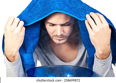 Young Man Inhales Steam To Treat A Blocked Nose