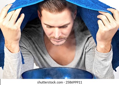 Young Man Inhales Steam To Treat A Blocked Nose