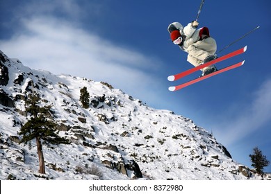 A young man jumping high at Lake Tahoe resort