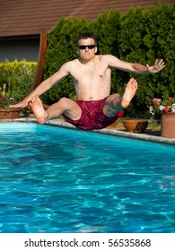 Young Man Is Jumping Into Pool