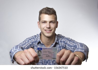 Young Man Just Received His Drivers License And Is Happy To Drive His Own Car Soon