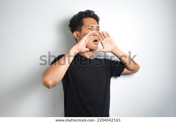 Young Man Keeping Hand Near Mouth Stock Photo 2204042165 | Shutterstock