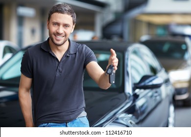 Young Man With The Keys At The Car