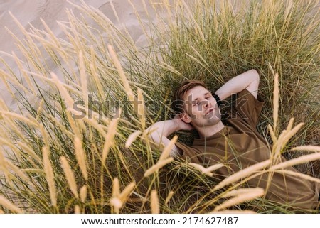 Similar – Image, Stock Photo Closed dandelion flower after rain
