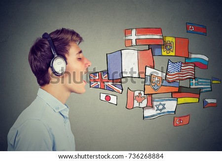 Young man learning different languages
