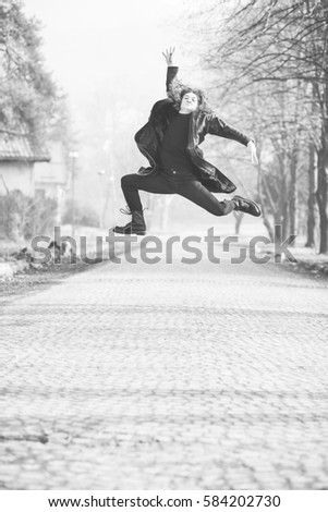 Similar – Woman walking on a fallen tree trunk