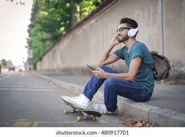 Young Man Listening To Music