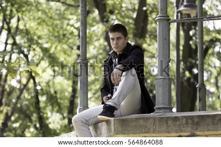 Similar – young tourist walks around the summer city