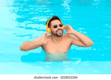 Young Man Listening Music Swimming Pool Stock Photo 2018552204