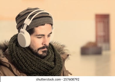 A Young Man Listens To Music In An Urban Image Of Modern Life Istagram Style Toned