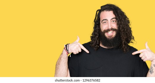 young-man-long-hair-beard-260nw-1296376582.jpg