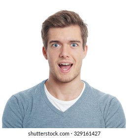 Young Man Looking Pleasantly Surprised With Open Mouth