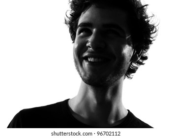 Young Man Looking Up Portrait Silhouette In Studio Isolated On White Background