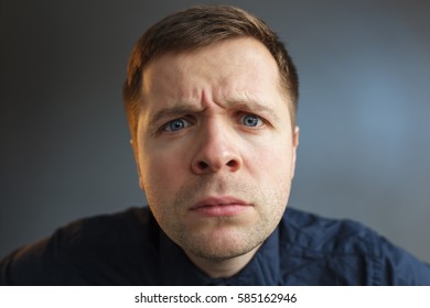 Young Man Looking Seriously Forward Carefully Stock Photo 585162946 ...