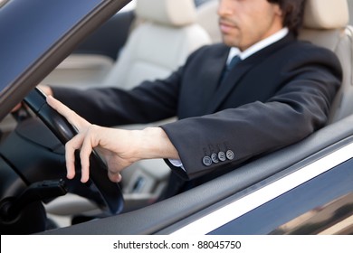 Young Man In Luxury Sports Car