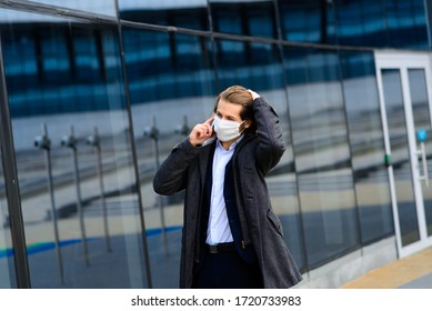 Young Man In A Medical Mask Outside, No Money, Crisis, Poverty, Hardship, Isolation.