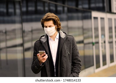 Young Man In A Medical Mask Outside, No Money, Crisis, Poverty, Hardship, Isolation.