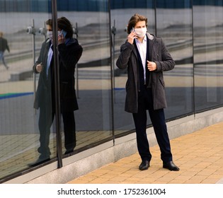 Young Man In A Medical Mask Outside, No Money, Crisis, Poverty, Hardship, Isolation.