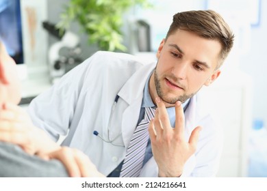 Young Man Medical Worker In White Uniform, Give Consultation To Patient About Neck Pain