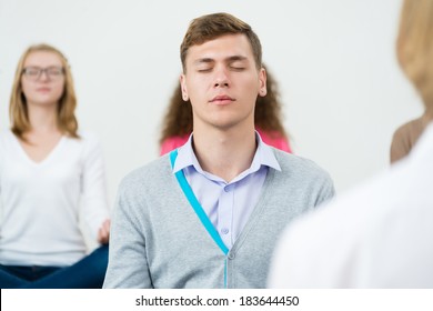 Young Man Meditating Closed Eyes Group Stock Photo 183644450 | Shutterstock