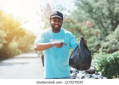 A Young Man, A Nature Conservationist, Walks To Collect Trash In The Mangrove Forest.