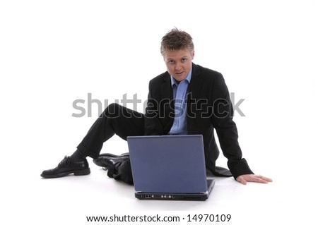 a young man with a notebook is hard working