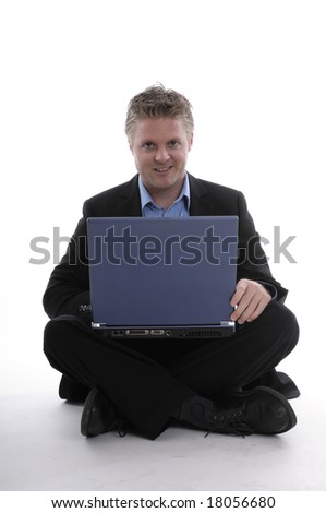 a young man with a notebook is hard working