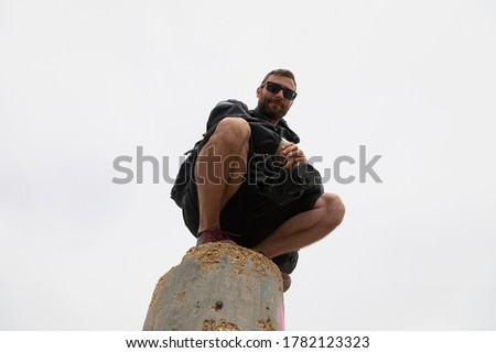 Similar – Image, Stock Photo man climbed a metal tower