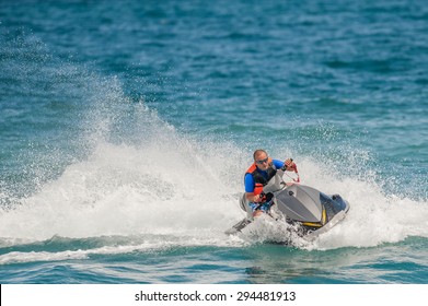 Young Man On Jet Ski, Tropical Ocean, Vacation Concept