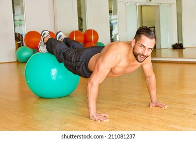 Young Man On A Stability Ball