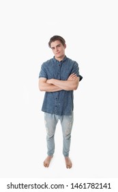 Young Man On White Background Arms Folded