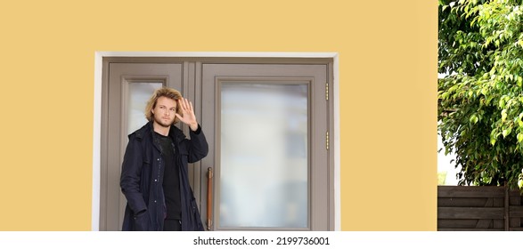 Young Man Opening The Door Of His House.Inviting The Guests