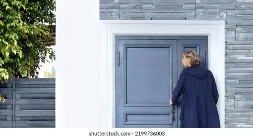 Young Man Opening The Door Of His House.Inviting The Guests