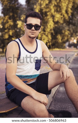 Similar – Close up of young man with sunglasses holding surfboard