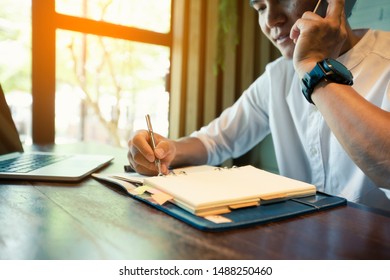 The Young Man, The Owner Of The Business, Is Calling His Client's Phone Back To Make An Appointment To Deliver The Product.