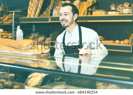 Similar – Image, Stock Photo African man works in pastry shop.